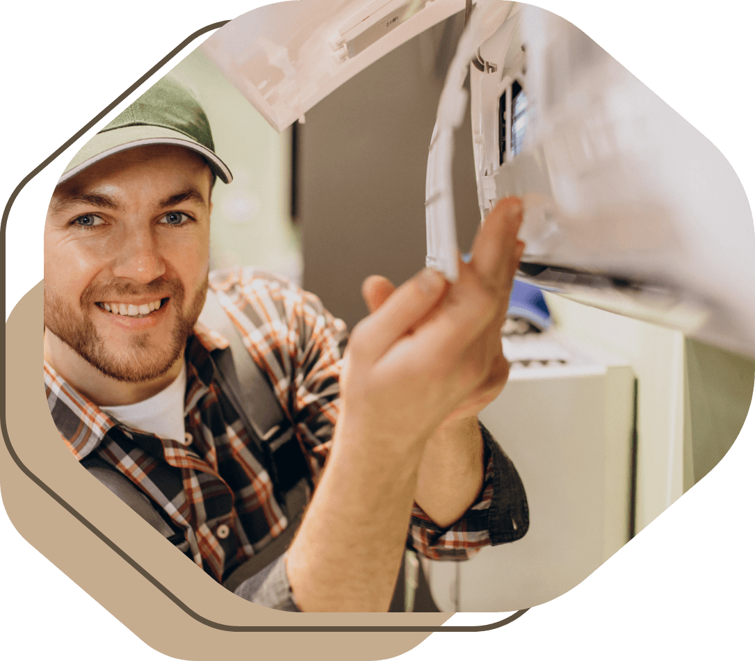 Technician fixing AC unit